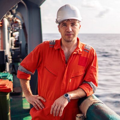 Man with safety helmet on deck 